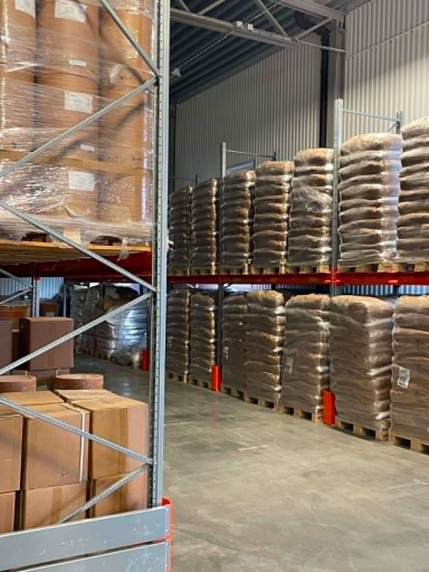 Labs Nutrition warehouse with pallets of raw materials